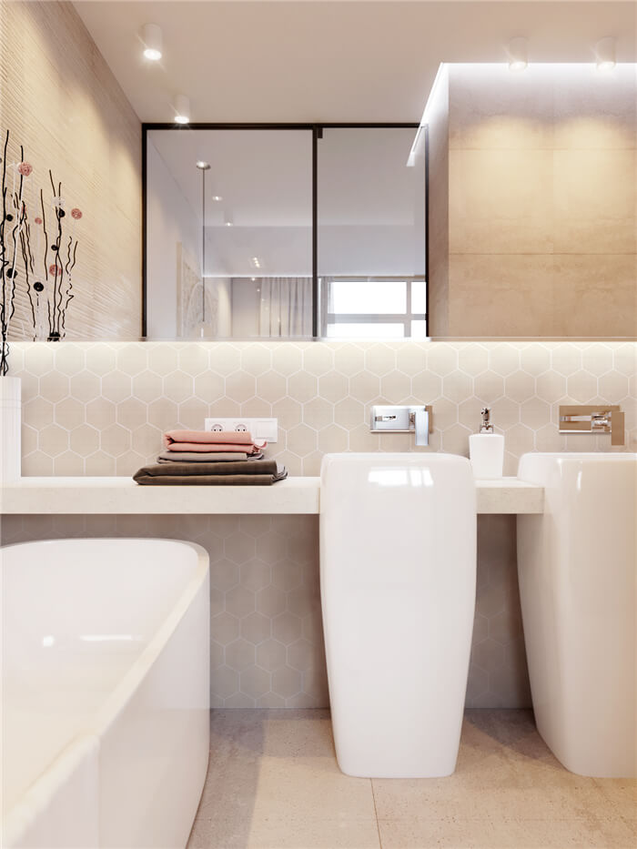 bathroom design with ligth tone flooring and beige hexagon tile wall.jpg