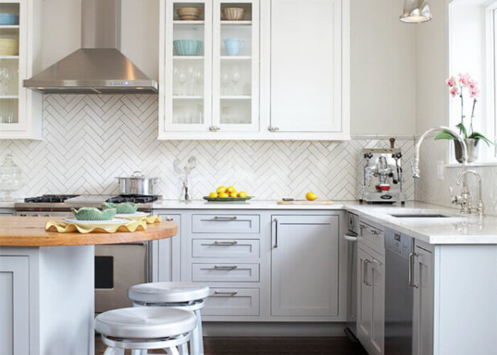 kitchen using classic white herringbone tile for backsplash decoration.jpg