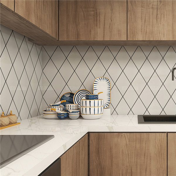 white rhombus tile backsplash