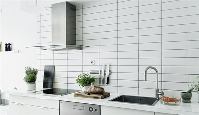 white tile backsplash for a neat kitchen.jpg