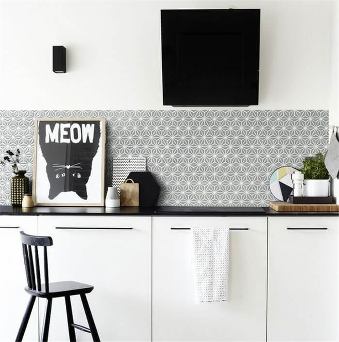 triangle mosaic tile installed on the kitchen backsplash and show a beautiful flower pattern.jpg