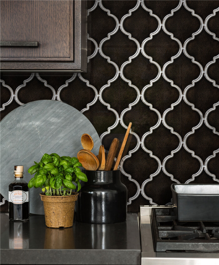 chocolate brown fambe patterned lantern tile as kitchen backsplash.jpg