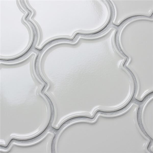 glossy glazed off white arabesque tile.jpg
