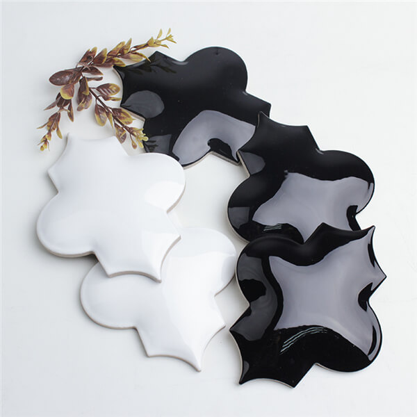 three dimensional whisper white and black arabesque tile.jpg
