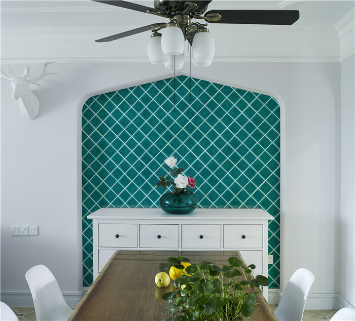 natural green mosaic screen wall decorates the dinning room.jpg