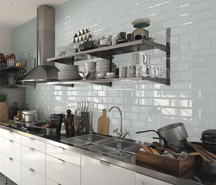 using glossy white glass subway tile for kitchen backsplash decoration.jpg