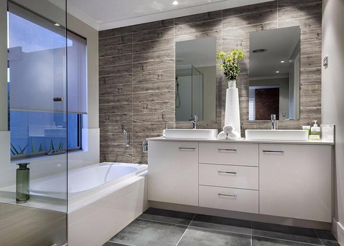 bathroom using stackbond wood look ceramic tile on wall.jpg