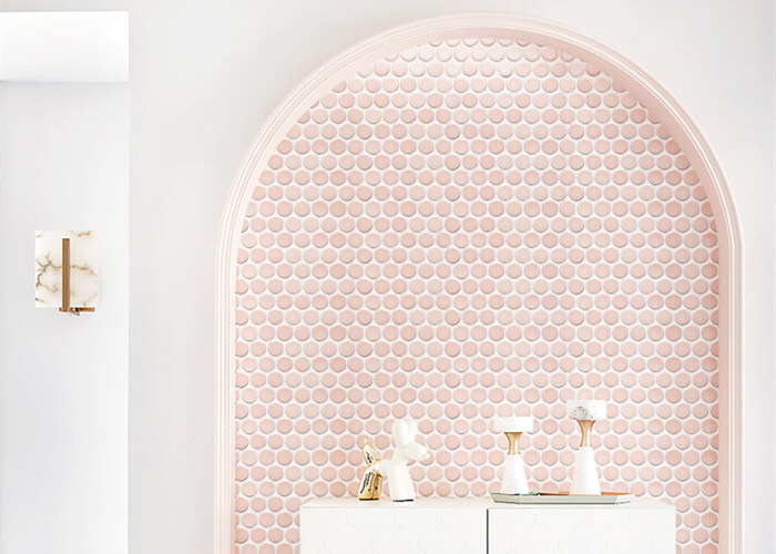 use pink penny tile to decorate arched door.jpg