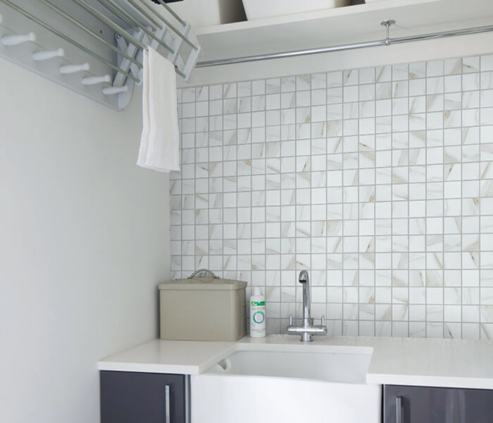 a neat bathroom with imitation marble porcelain mosaic tile installed.jpg