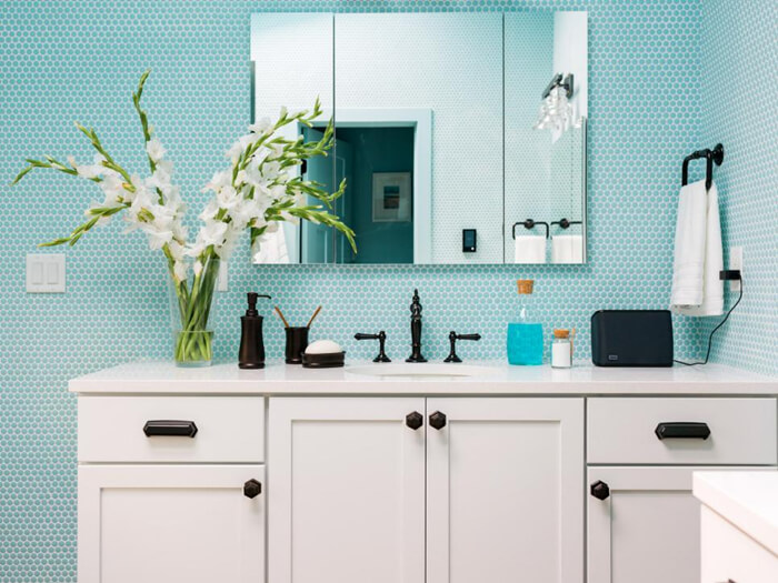 light blue penny tile backsplash in bathroom.jpg