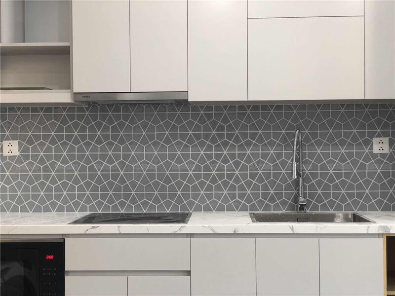 gray porcelain mosaic tiles as backsplash