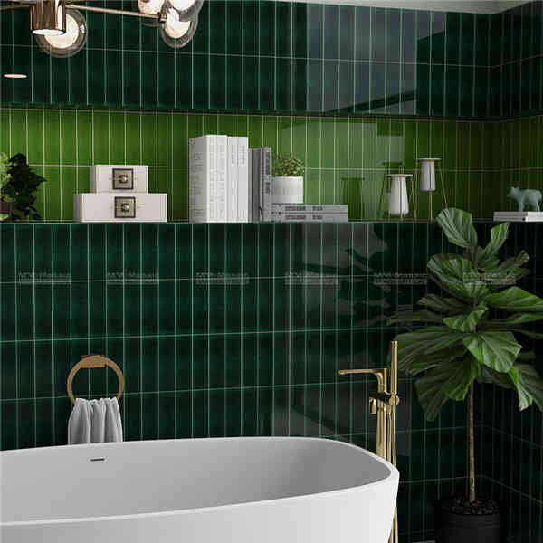 modern bathroom with dark green subway wall tile