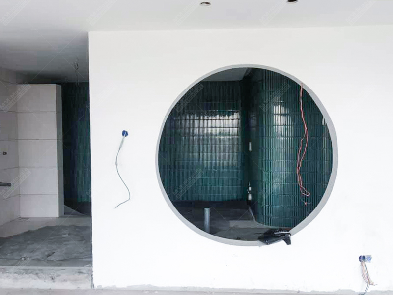 bathroom design with green kiln wall tiles