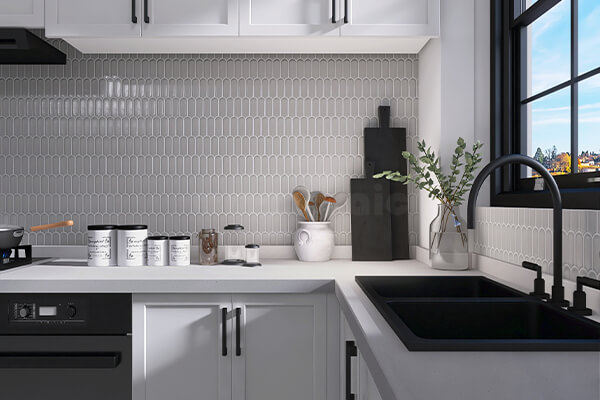 gray feather mosaic tile as kitchen backsplash